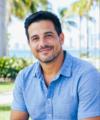 Hispanic man in a blue shirt, in Miami.